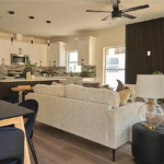 Plan 0112 by HeLo Homes – open living room and kitchen